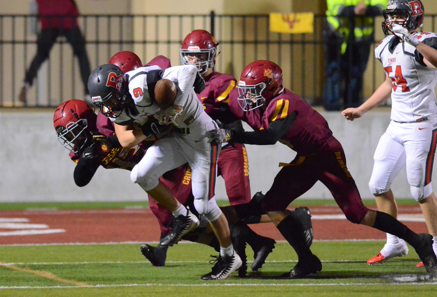 Vintage football vs. Redwood